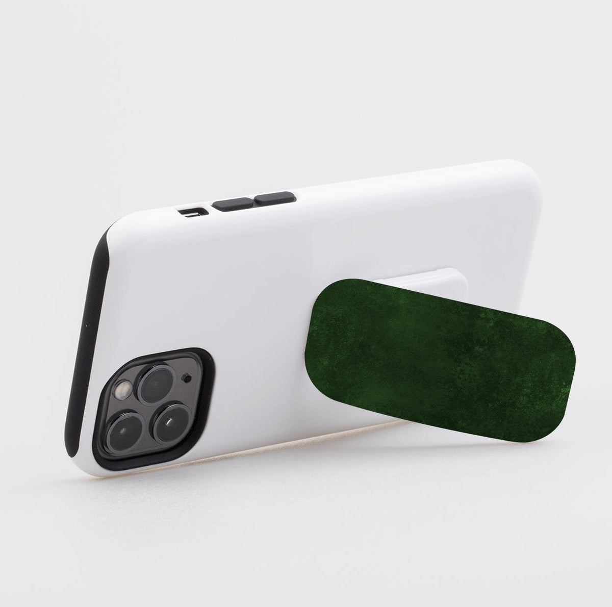 Absinthe green rectangular Clickit phone stand attached to the back of a white smartphone case on a white background.