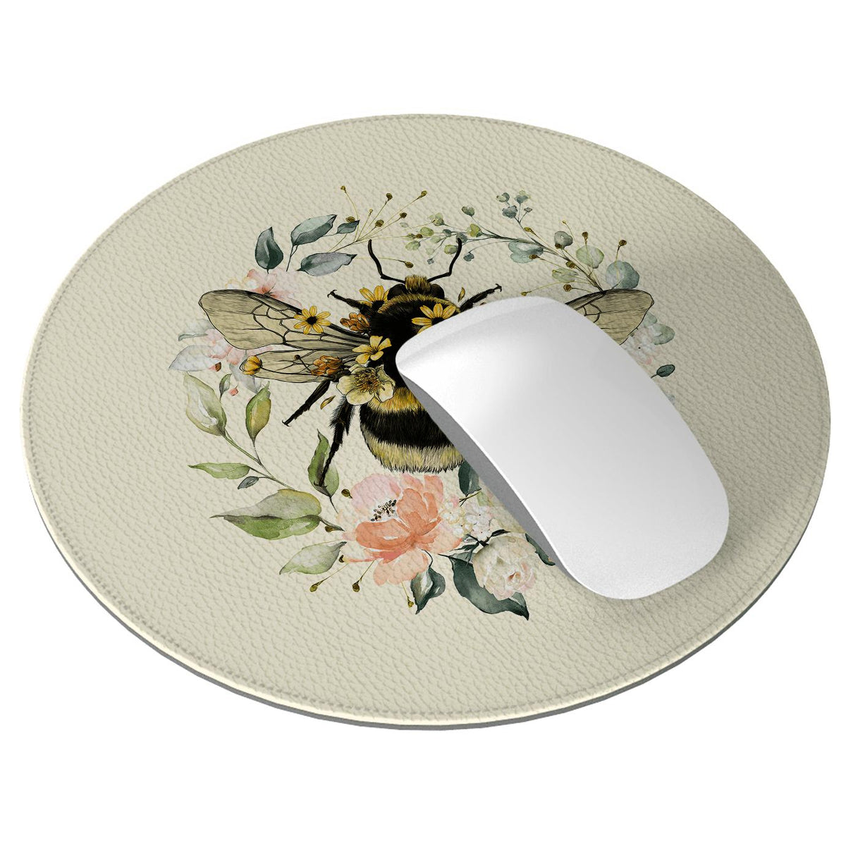 Round cream vegan leather mouse mat with a textured cross-hatch finish, featuring a floral bee illustration and white mouse.