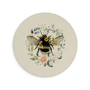 Round cream vegan leather mouse mat featuring a detailed bee surrounded by a watercolor floral wreath.