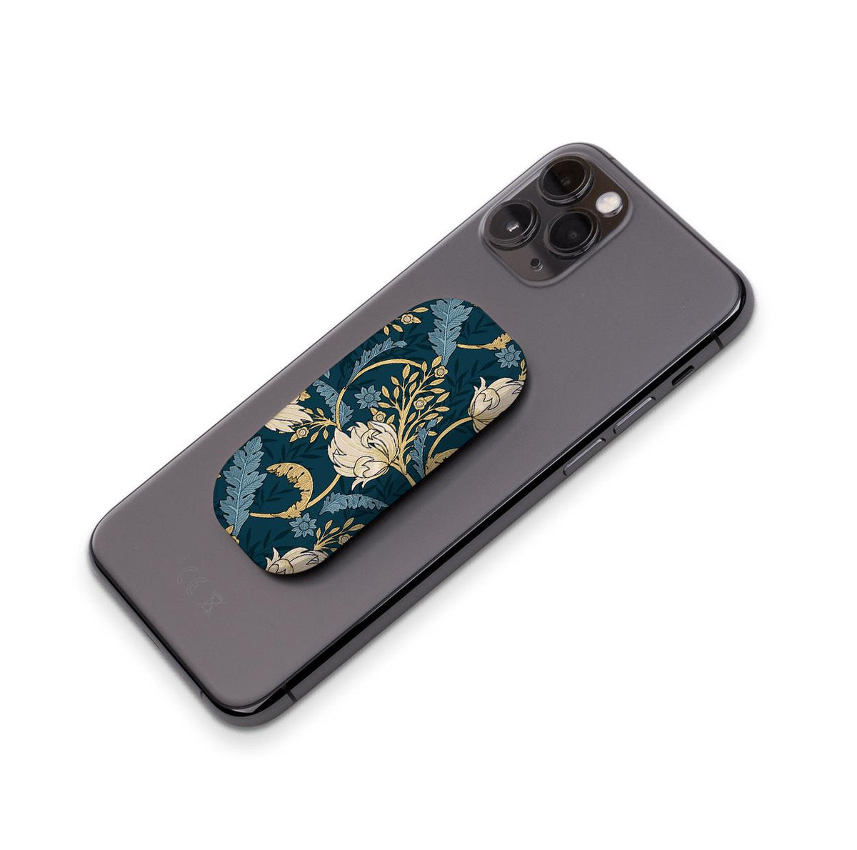 Beeston phone stand with a dark teal floral pattern attached to the back of a grey smartphone.