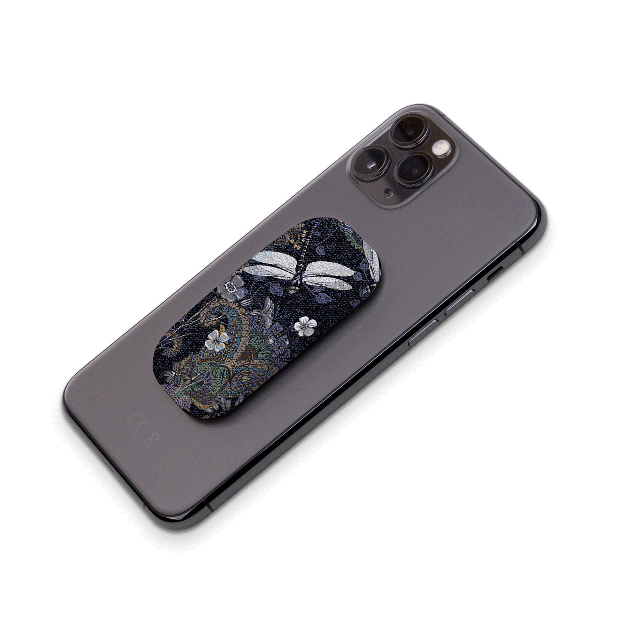 Belsay Flickit phone stand with a navy dragonfly and floral pattern attached to the back of a grey smartphone.