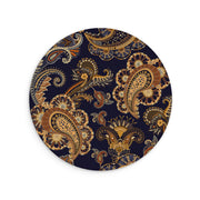 Round vegan leather mouse mat featuring a navy blue background with an intricate gold and brown paisley floral pattern.