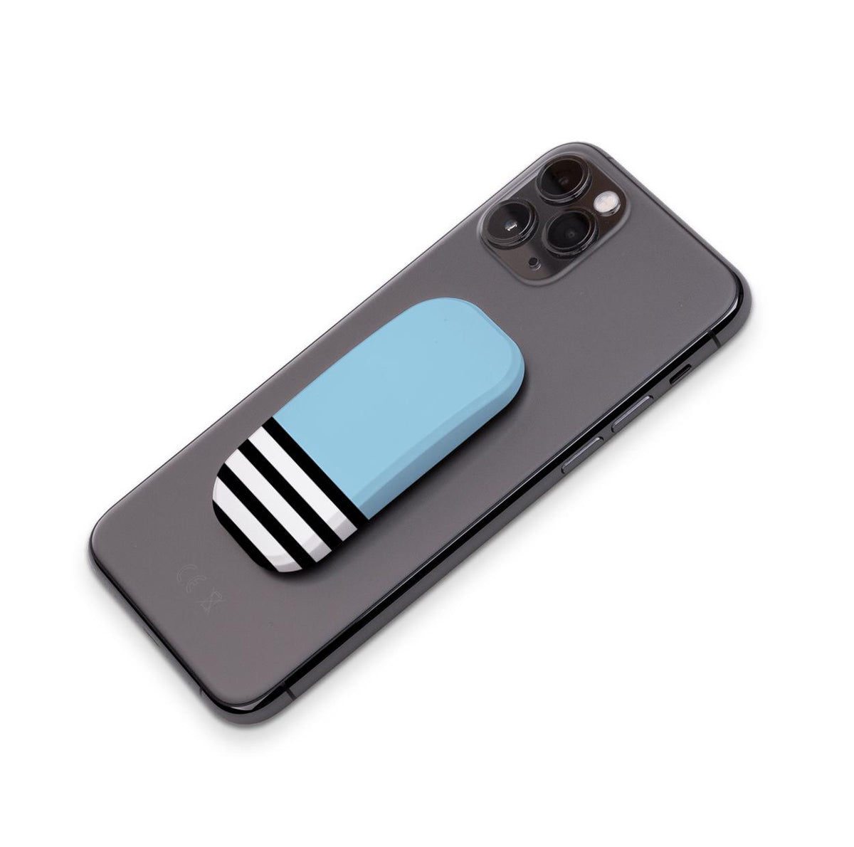 Light blue and black-and-white striped phone stand attached to the back of a black smartphone.