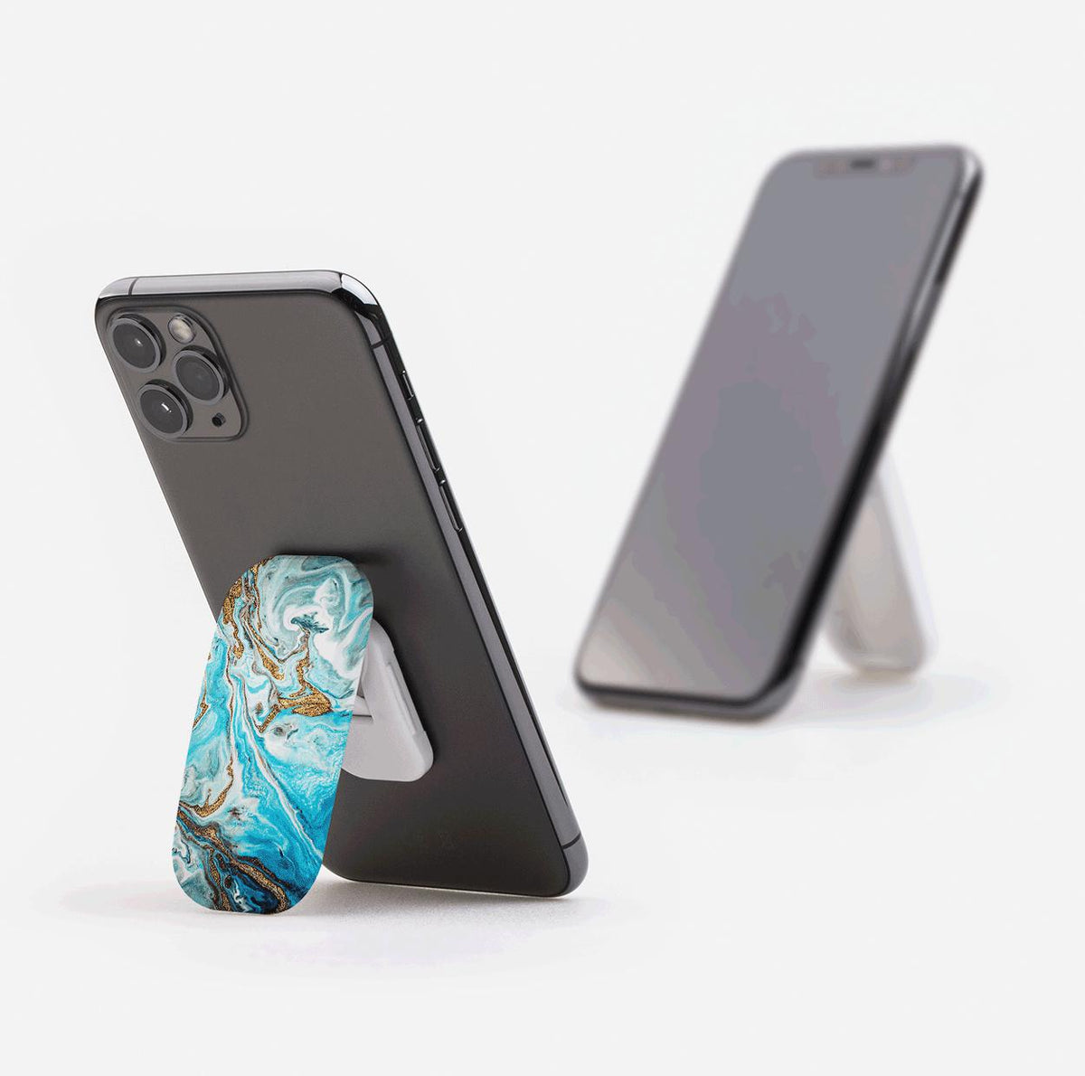 Blue Royal marble-patterned Flickit phone stand attached to a smartphone, functioning as a landscape and portrait kickstand.