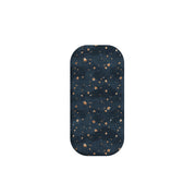 Bode Galaxy phone stand with a navy blue night sky pattern featuring shimmering gold stars and a smooth, rounded design.