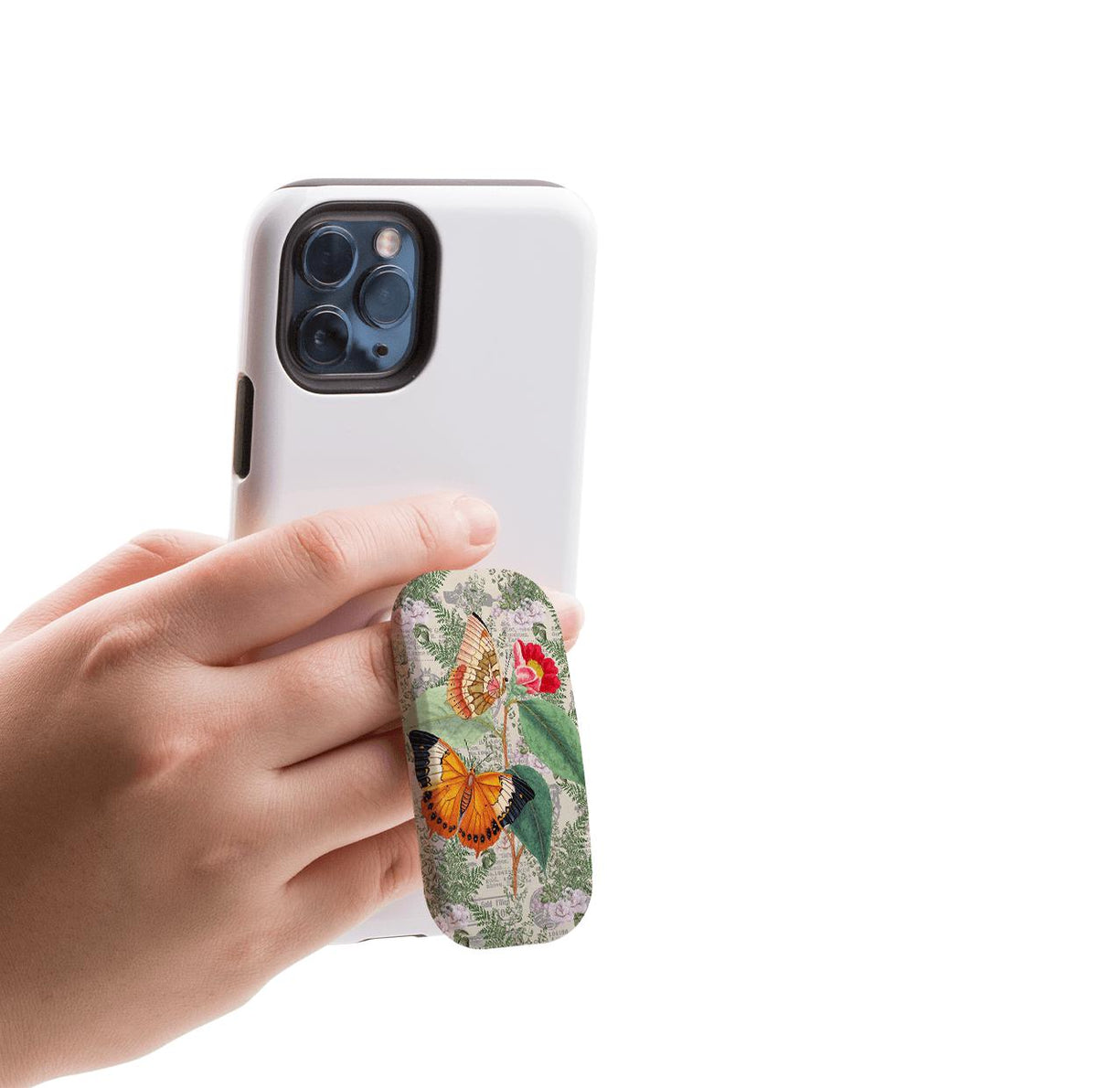 Butterfly Stories Clickit Handyständer mit vintage botanischem Schmetterlings- und Blumenmuster, befestigt an einem weißen Smartphone