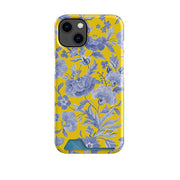 Yellow phone case with blue floral pattern and a built-in sliding card slot at the bottom.