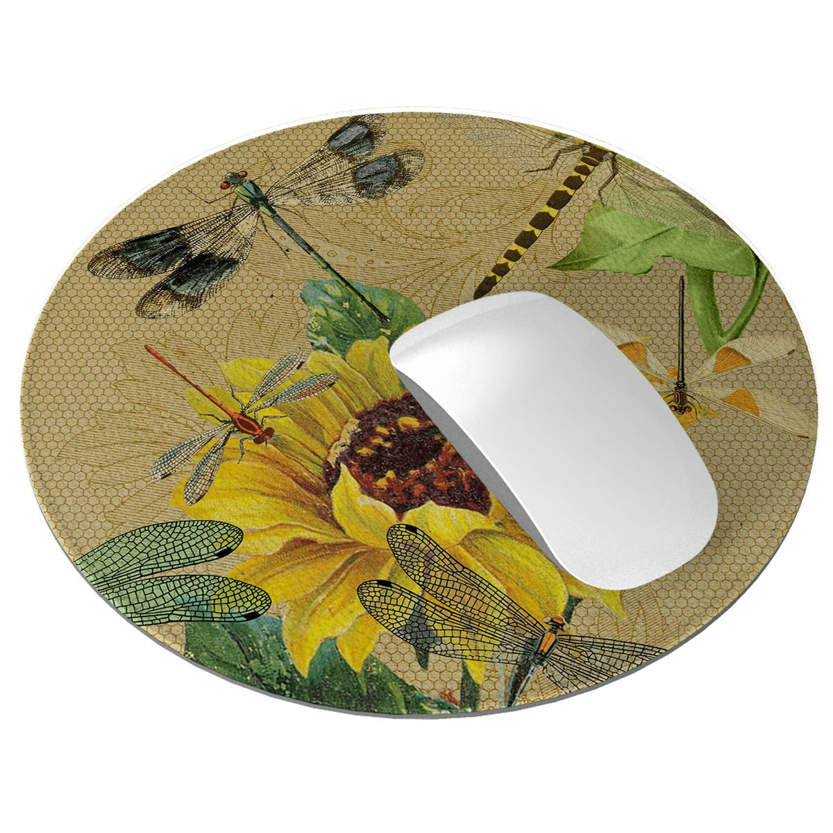 Round vegan leather mouse mat with a dragonfly and sunflower print and a white computer mouse on top.
