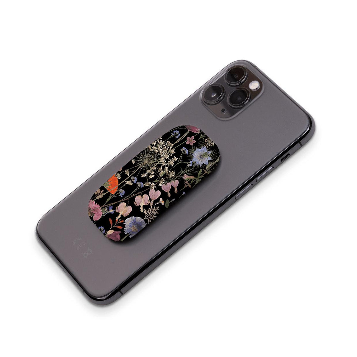 Clickit phone stand with a dark floral botanical print attached to the back of a grey smartphone.
