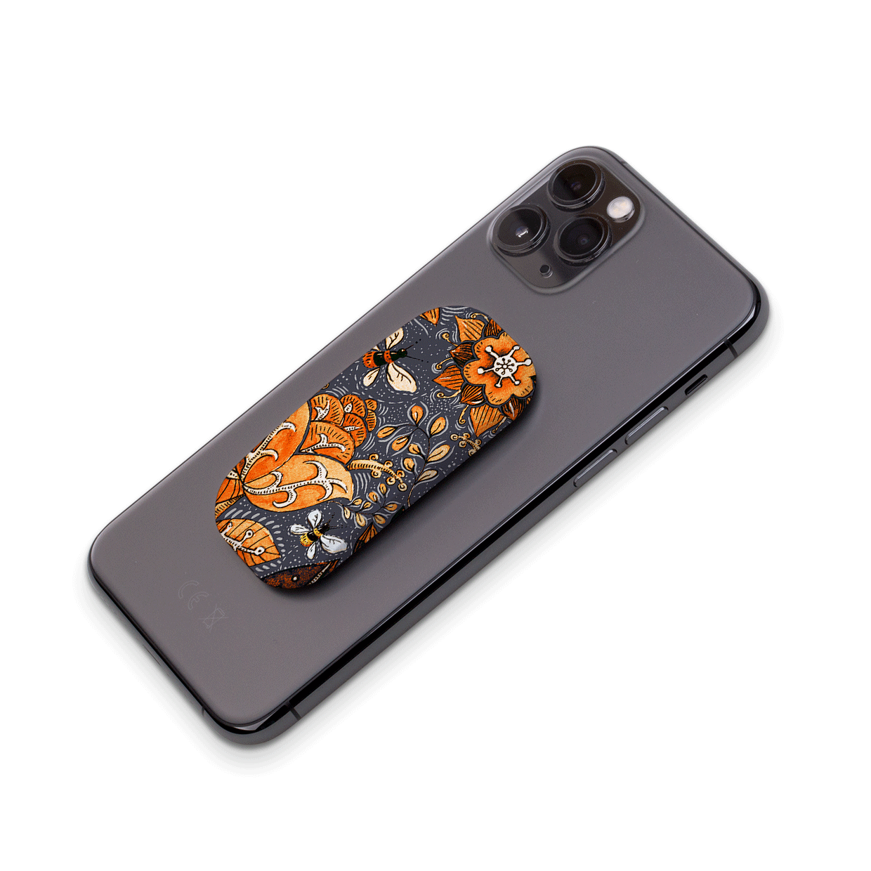 Hidcote Manor Flickit phone stand with orange floral and bee pattern attached to the back of a black smartphone.