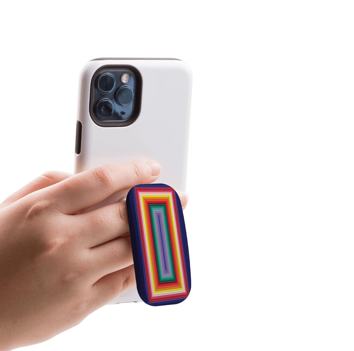 Hand holding a white smartphone with a rectangular, multi-colored striped Myriad phone stand attached to the back.
