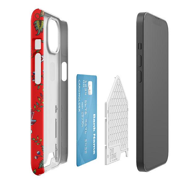 Red floral hard plastic phone case with a hidden sliding card slot and space for one credit card.