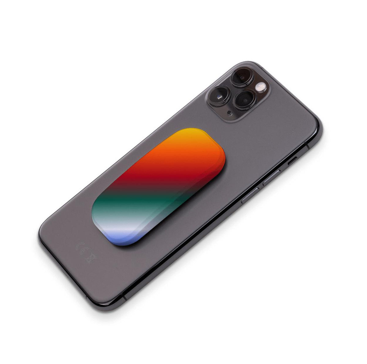 Sun Sequence phone stand with a vibrant gradient of orange, red, green, and blue attached to the back of a smartphone.