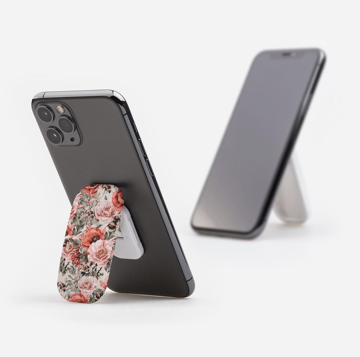 Windsor phone stand with a floral pattern attached to the back of a smartphone, functioning as a landscape kickstand.