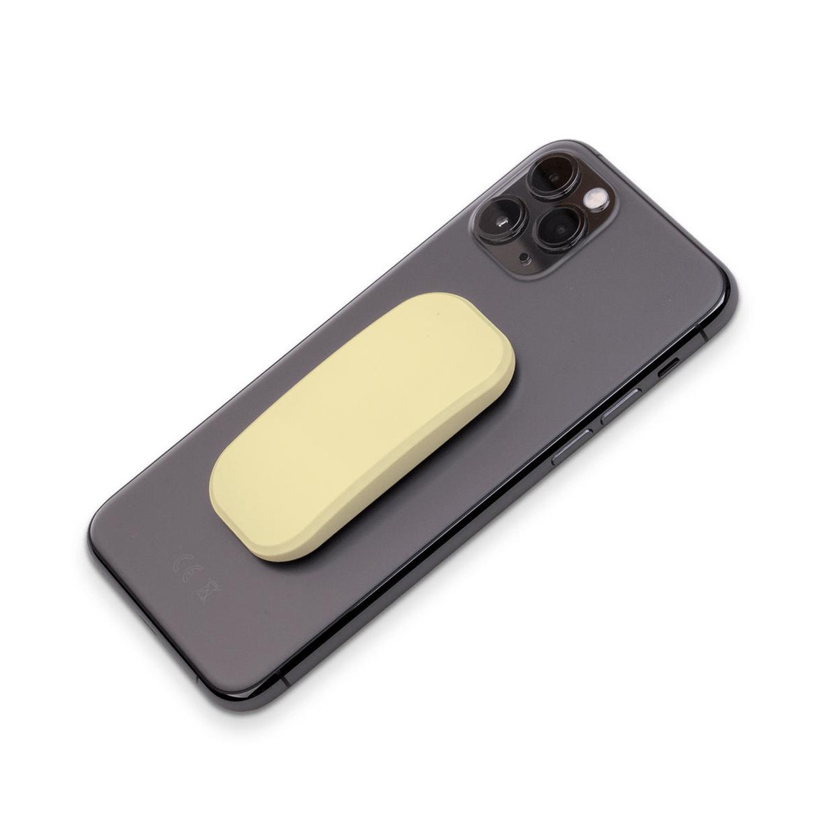 Minimalistischer gelber rechteckiger Handyständer, der an der Rückseite eines dunkelgrauen Smartphones befestigt ist.